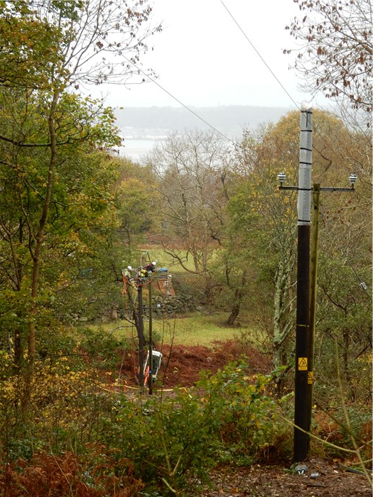 Scottish Power contractors working to upgrade the powerlines above the village 16 November 2015