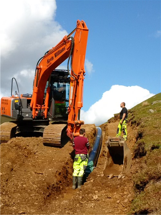 The pipe is drawn into the trench 3 June 2015
