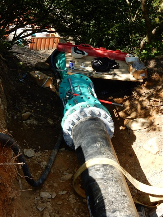 The polyethylene pipe under the forest road is connected to the steel pipe at the top of the bank 8 Sept 2015